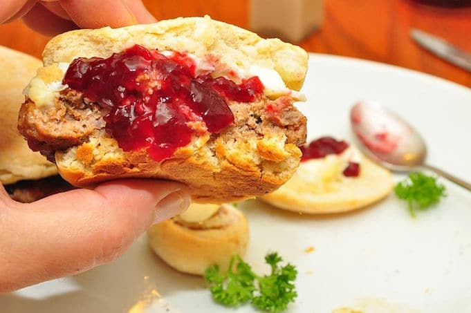 biscuit with sausage, egg , cheese and jelly